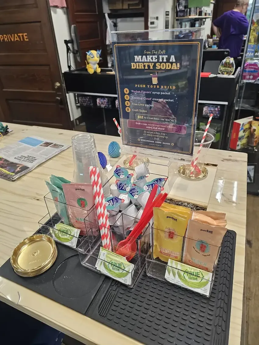 Make It a Dirty Soda build station — syrups, creamers, True Lime, and craft sodas